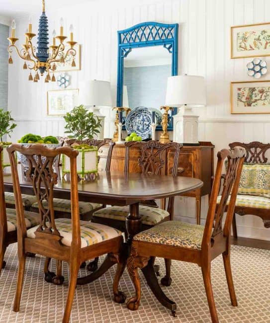 dining room with traditional brown furniture and chinoiserie accessories