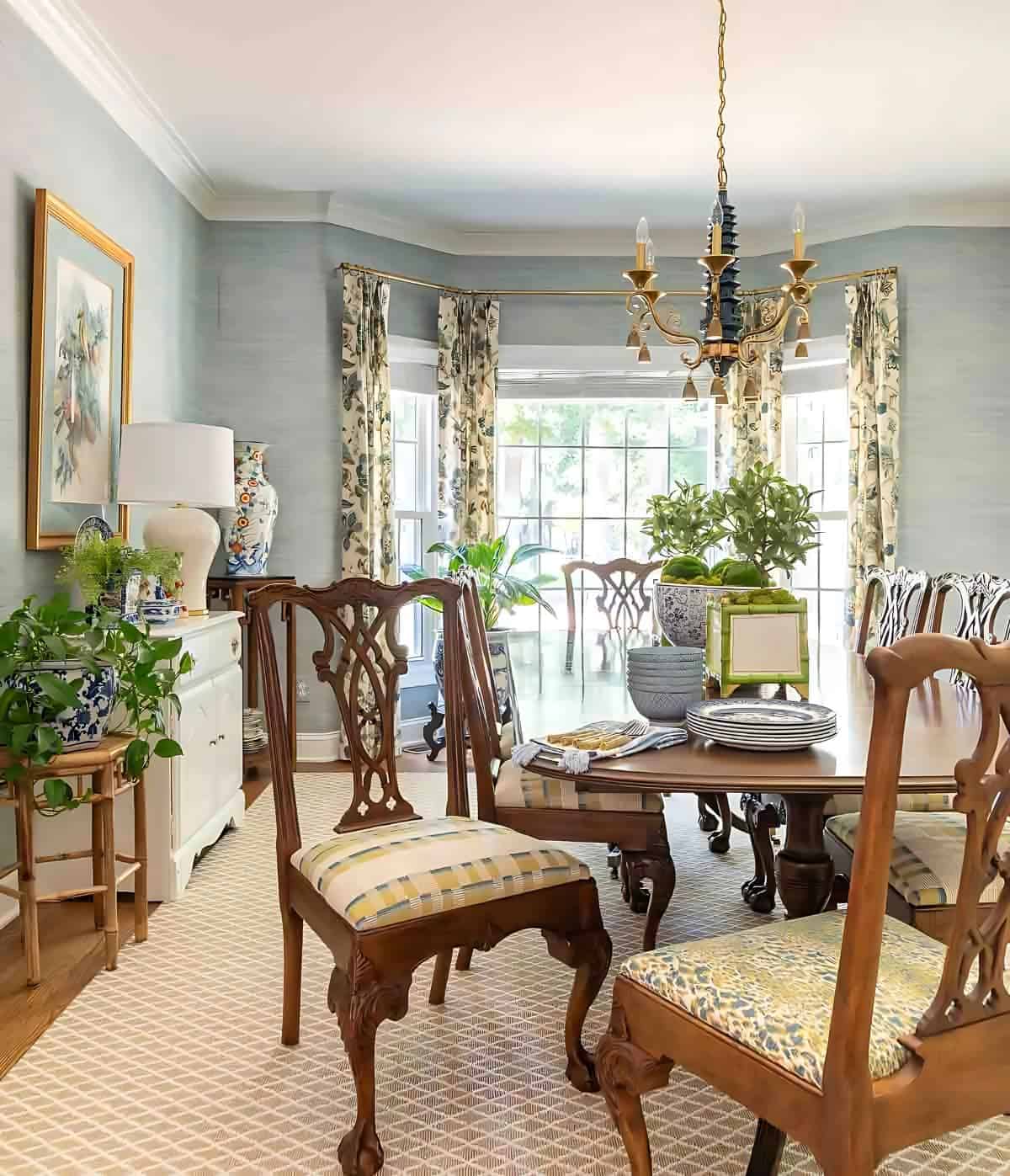 dining room with traditional brown furniture and chinoiserie accessories