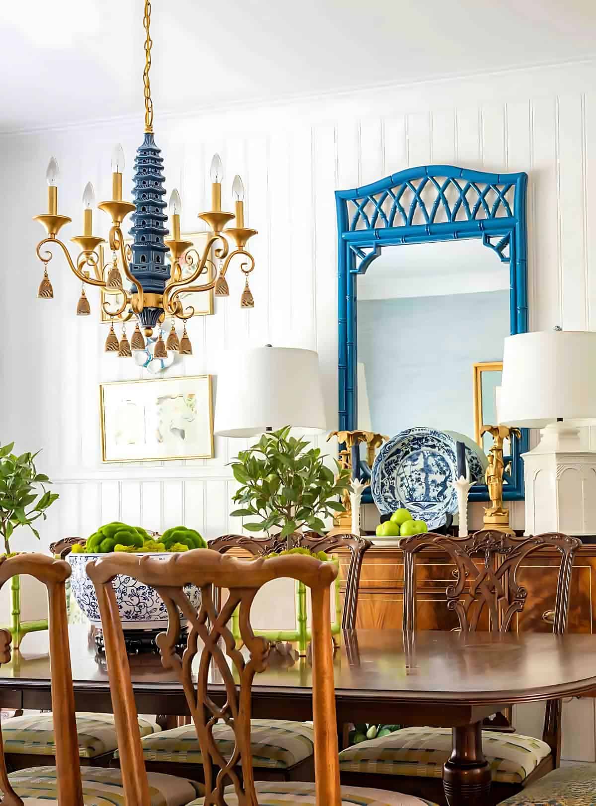 dining room with traditional brown furniture and chinoiserie accessories