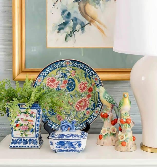 dining room with traditional brown furniture and chinoiserie accessories