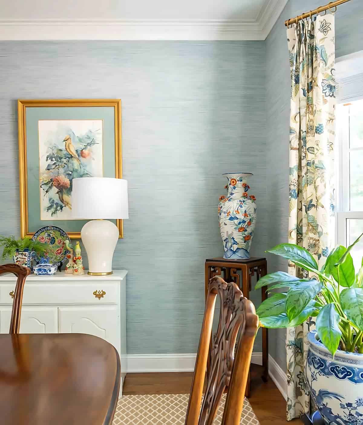 dining room with traditional brown furniture and chinoiserie accessories