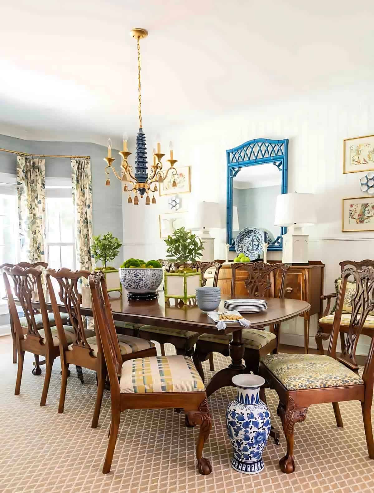 dining room with traditional brown furniture and chinoiserie accessories