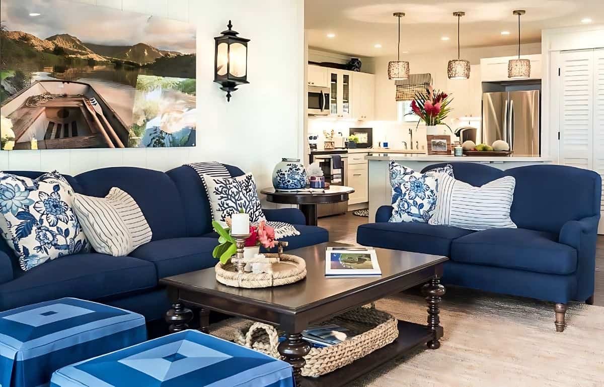 open floor plan living room with matching dark blue sofas