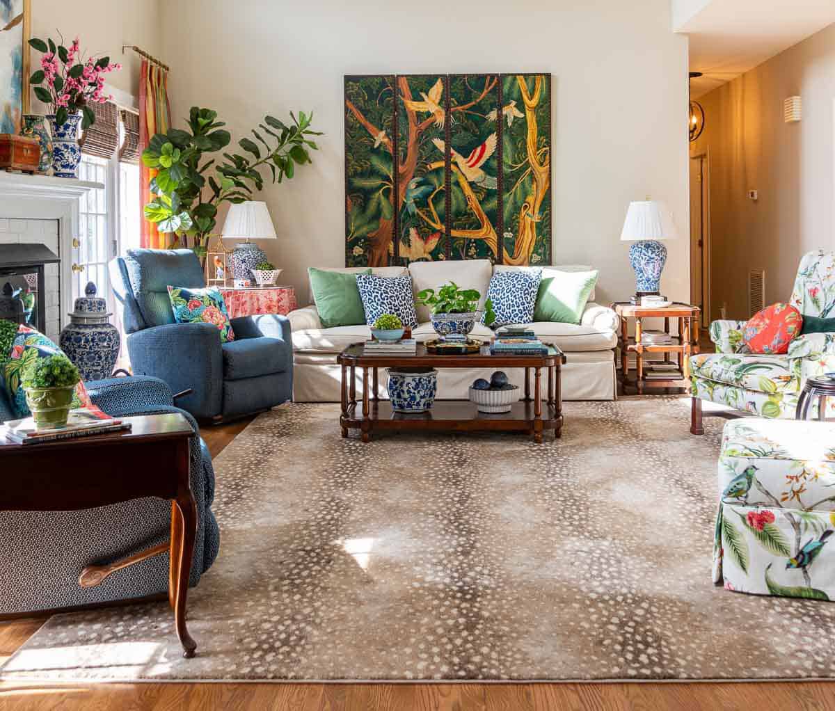 living room with colorful traditional furniture and accessories and an antelope print area rug