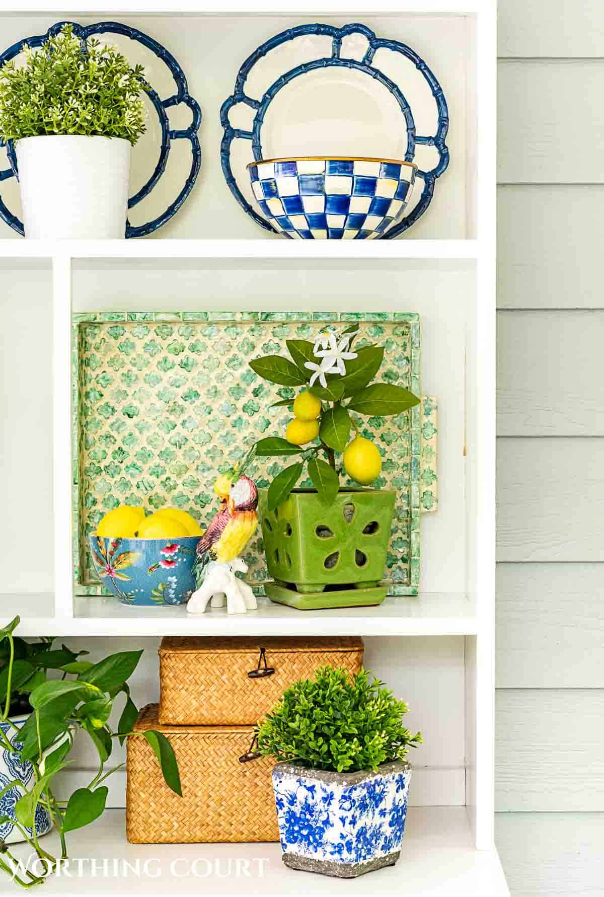https://www.worthingcourtblog.com/wp-content/uploads/2023/05/blue-and-green-porch-decorating-ideas-for-summer-1.jpg