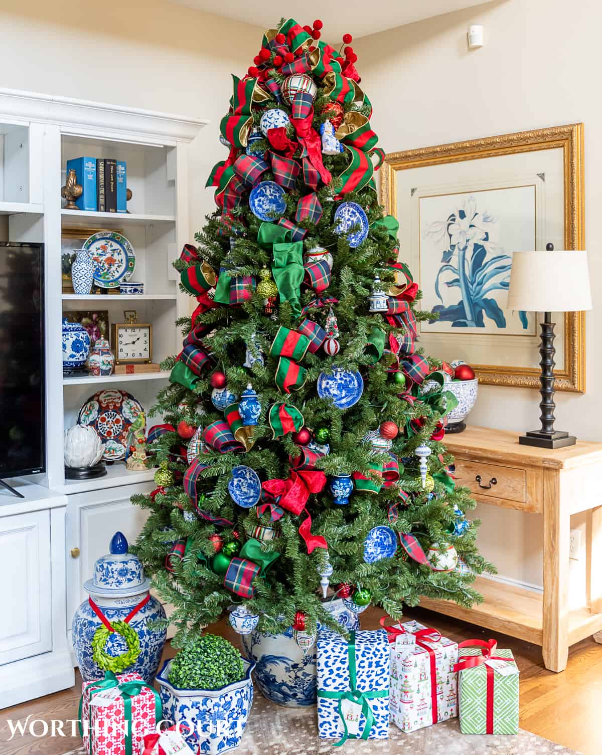 Christmas tree with traditional decorations in red, green, blue and white in a chinoiserie planters