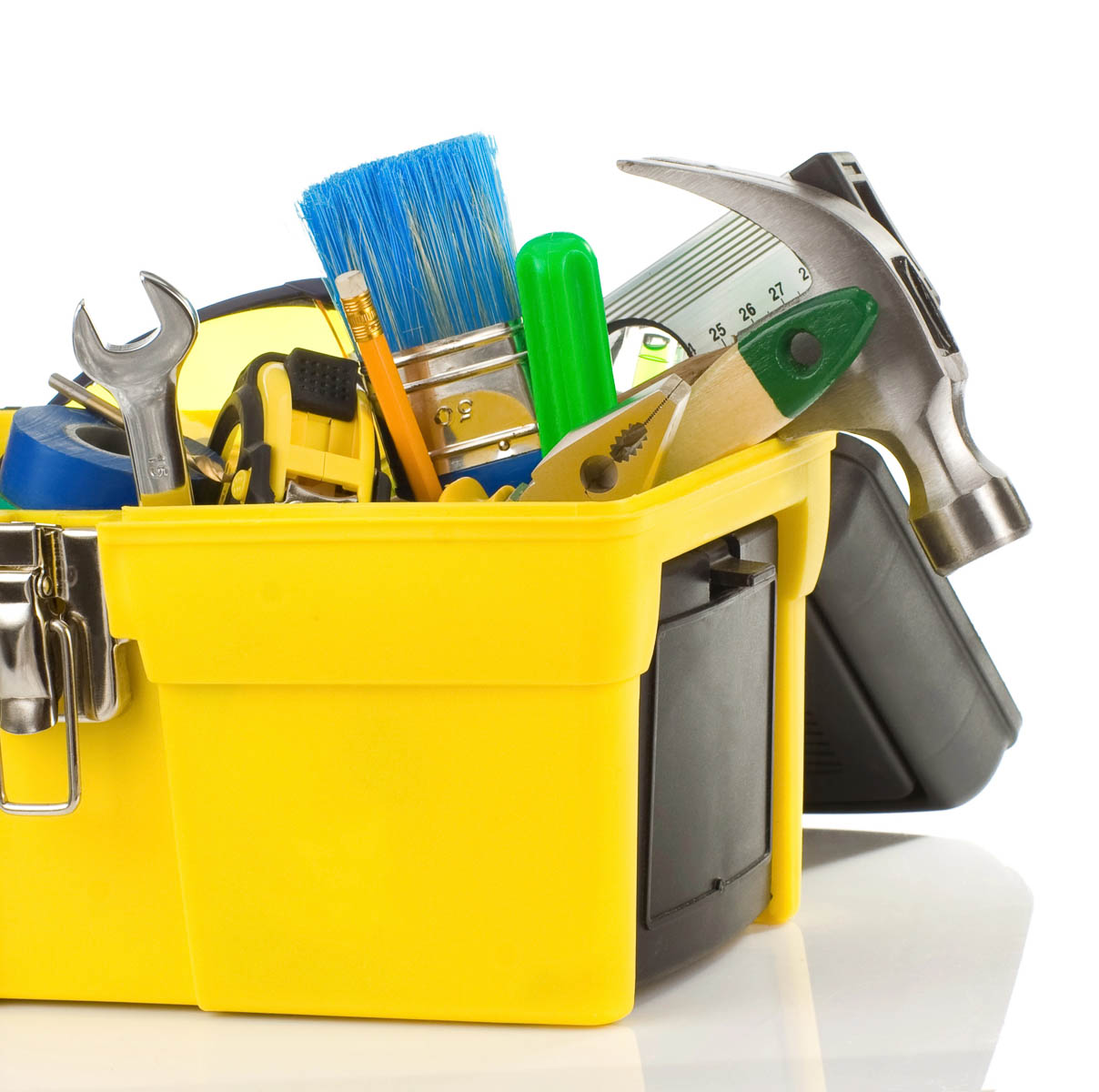 miscellaneous tools in a yellow toolbox