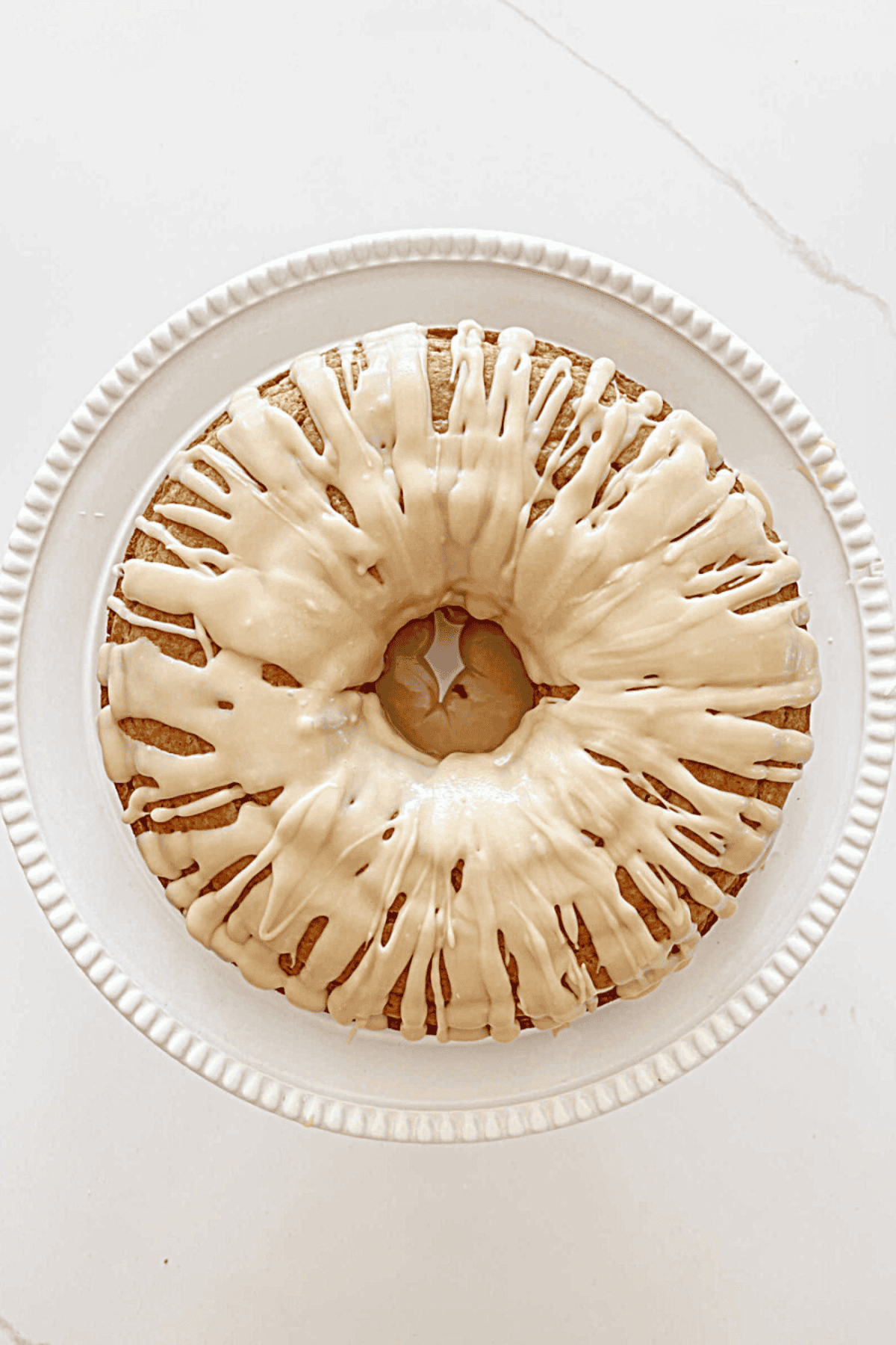 overhead view of a glazed bundt cake