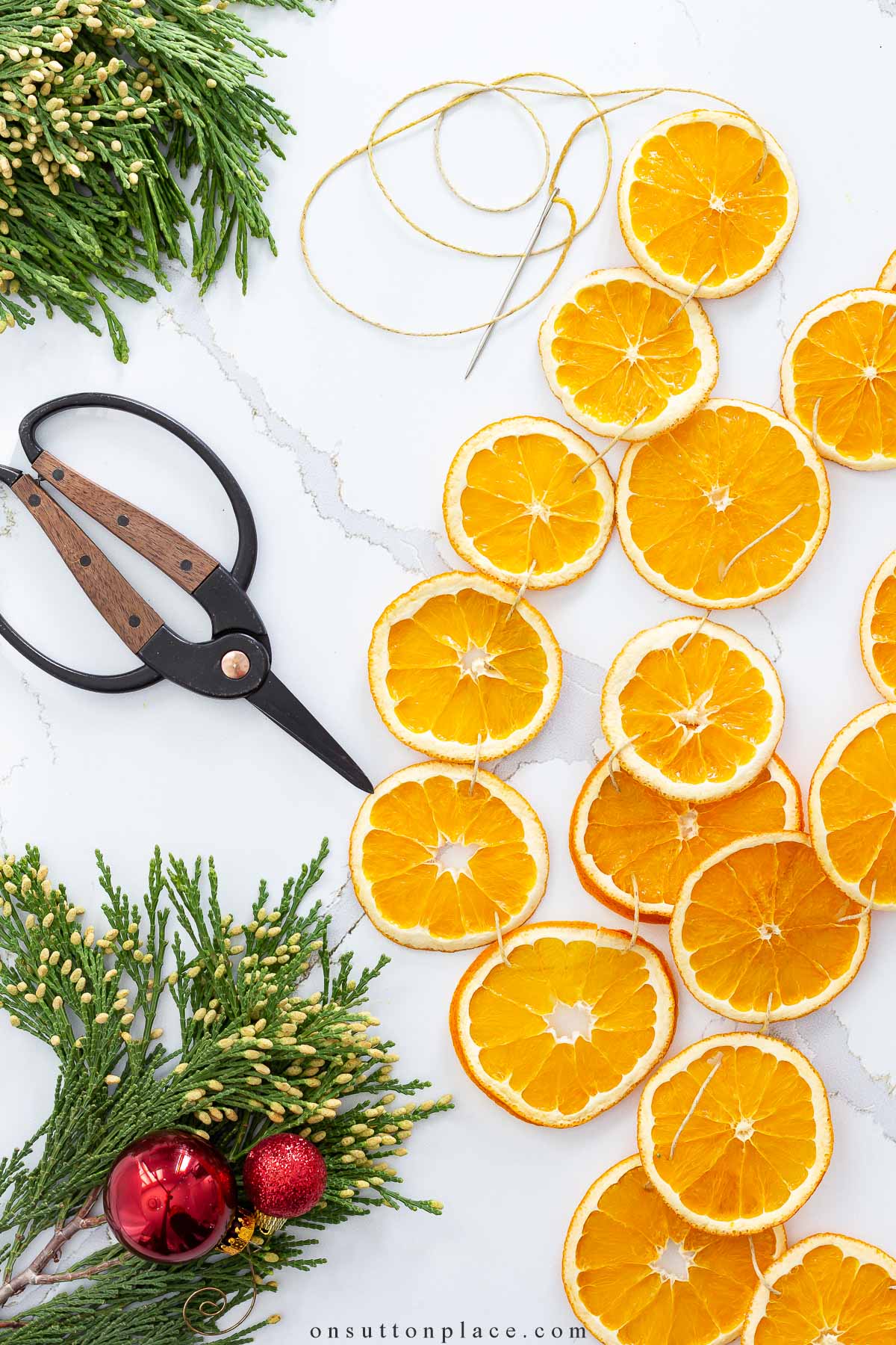 slices or oranges on a white counter