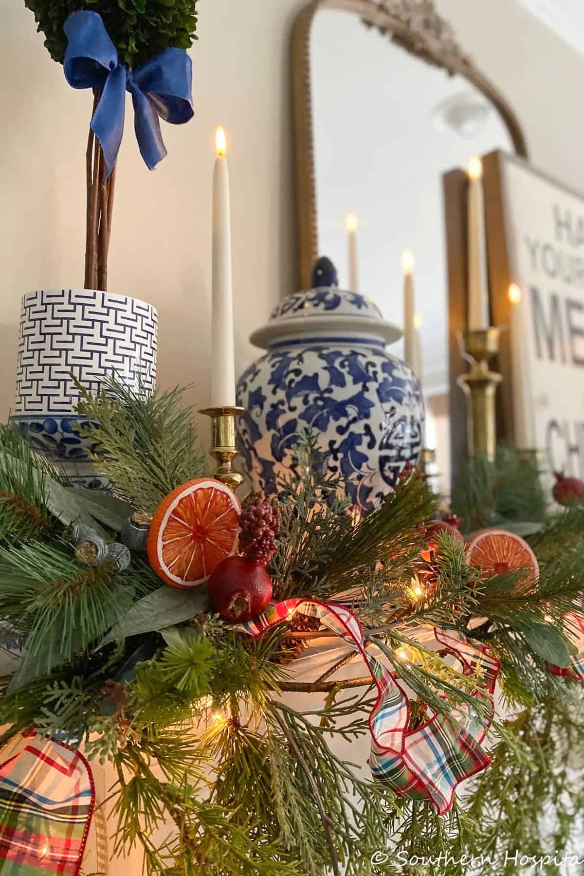 partial view of a mantel decorated for Christmas