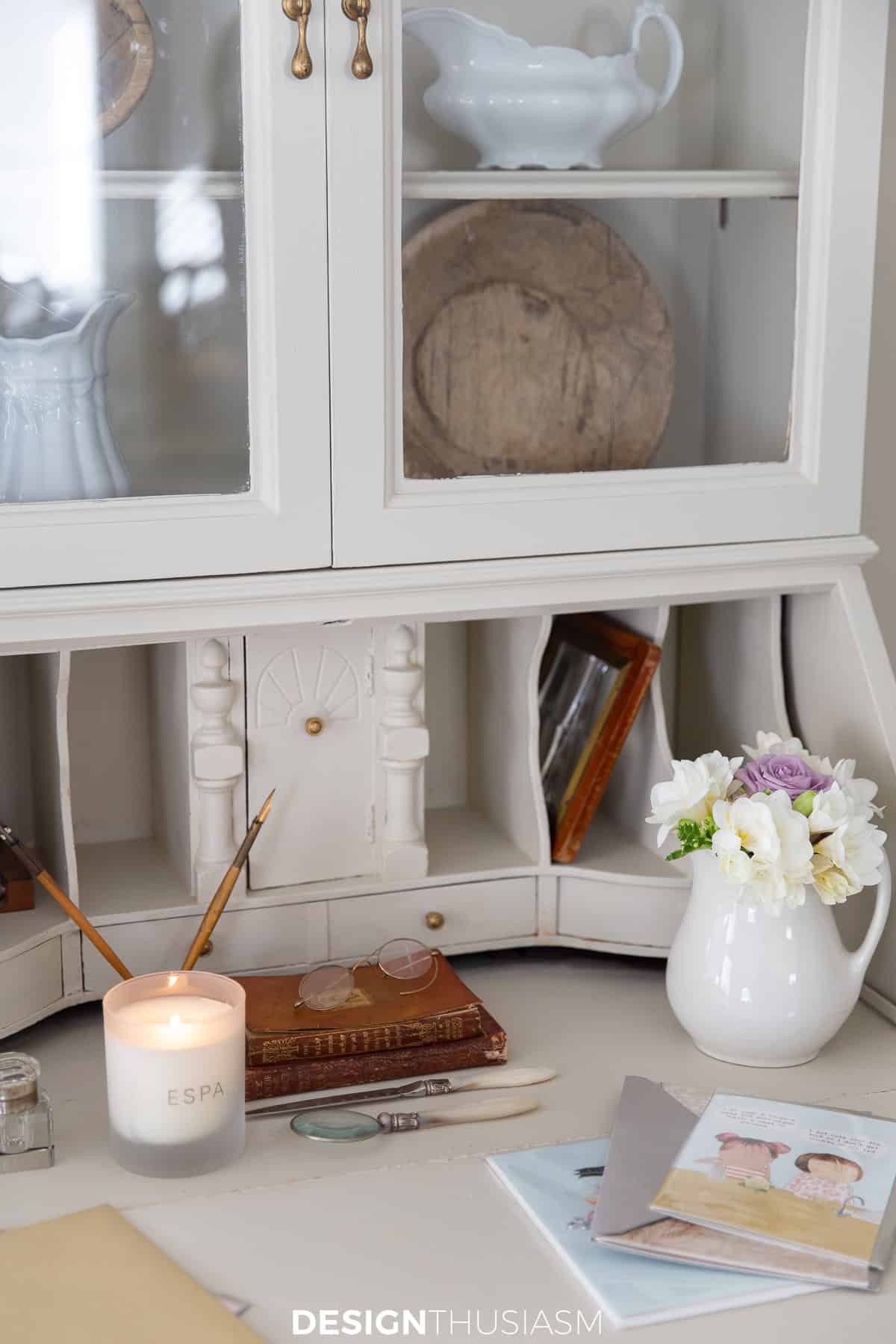 the inside of a white secretary desk