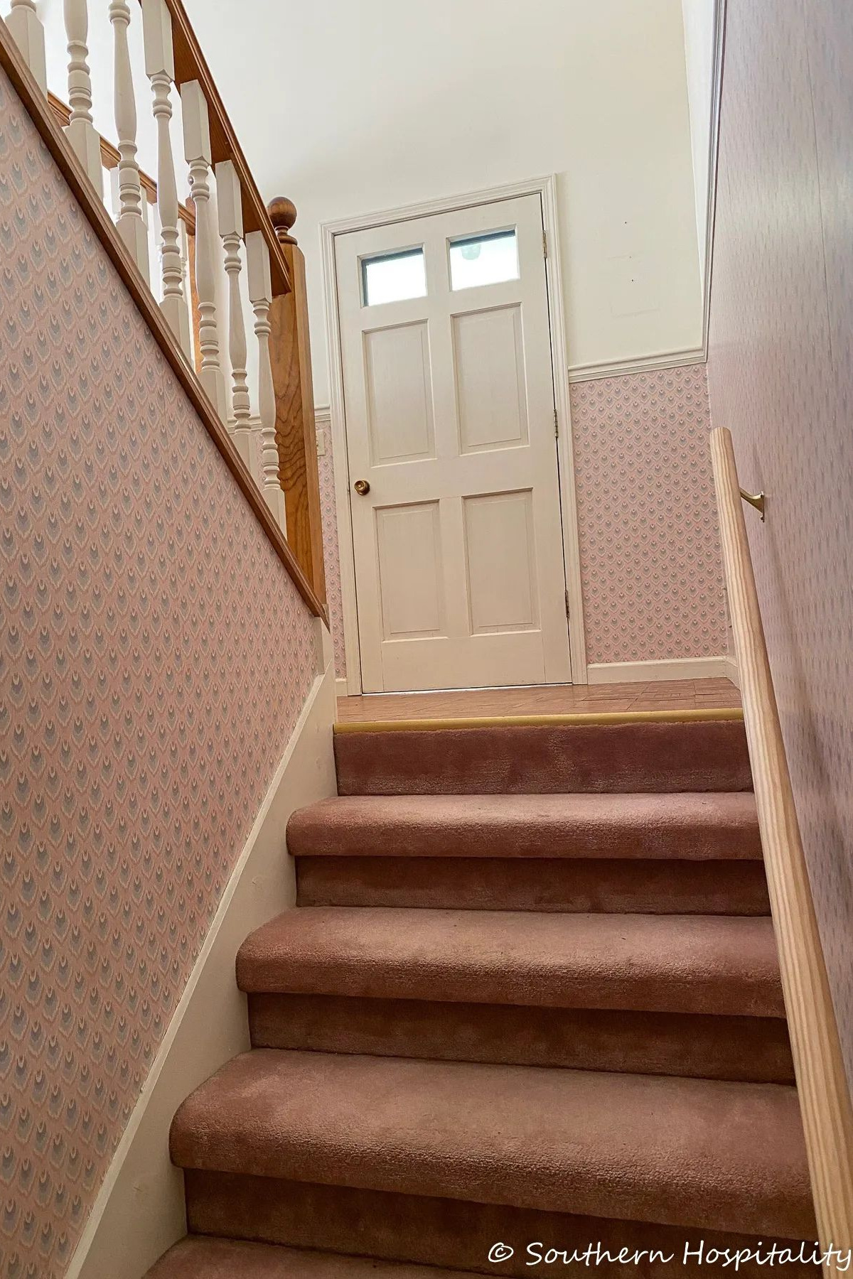 steps leading up to a front door landing indoors