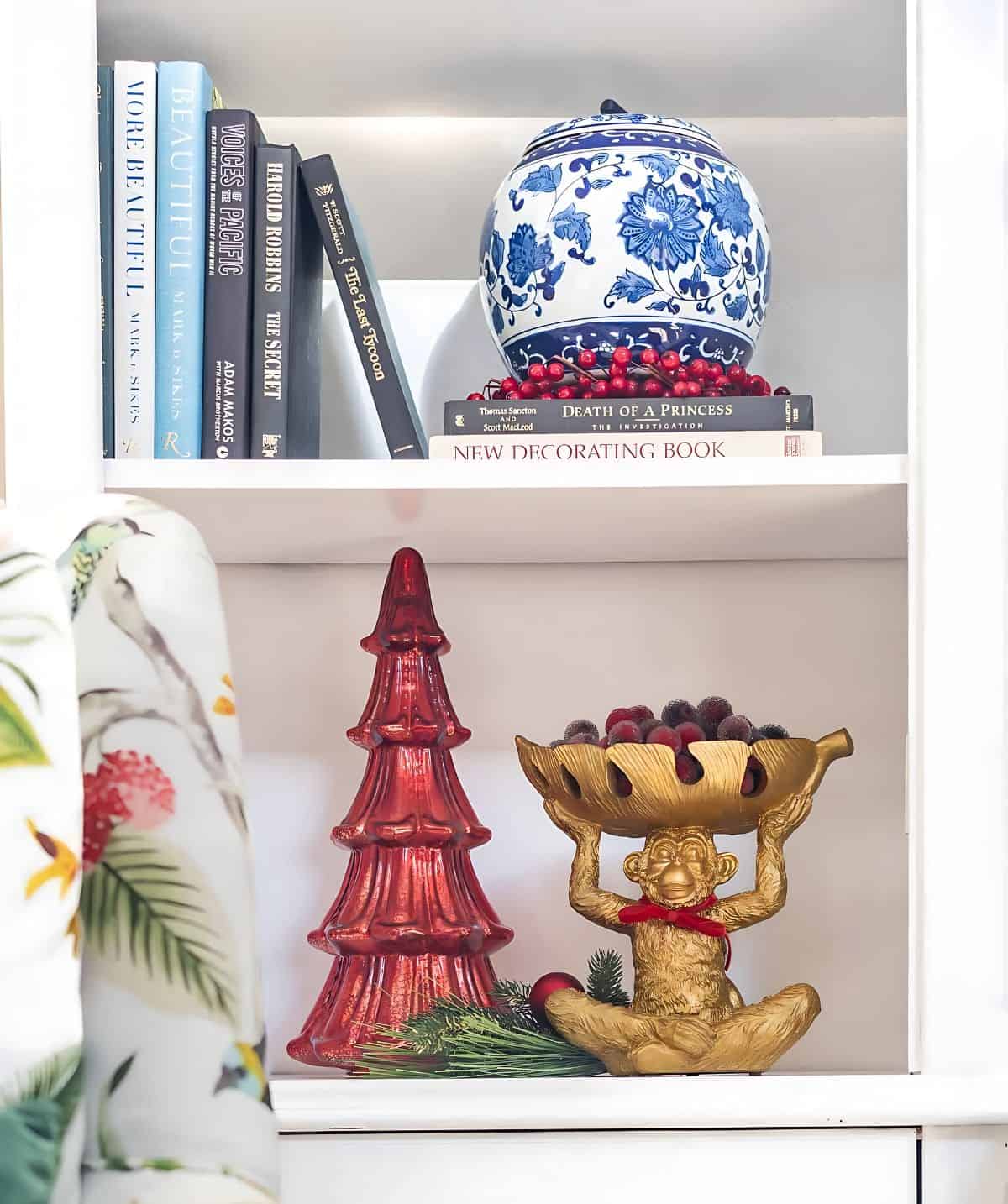 Christmas decor on a white bookcase