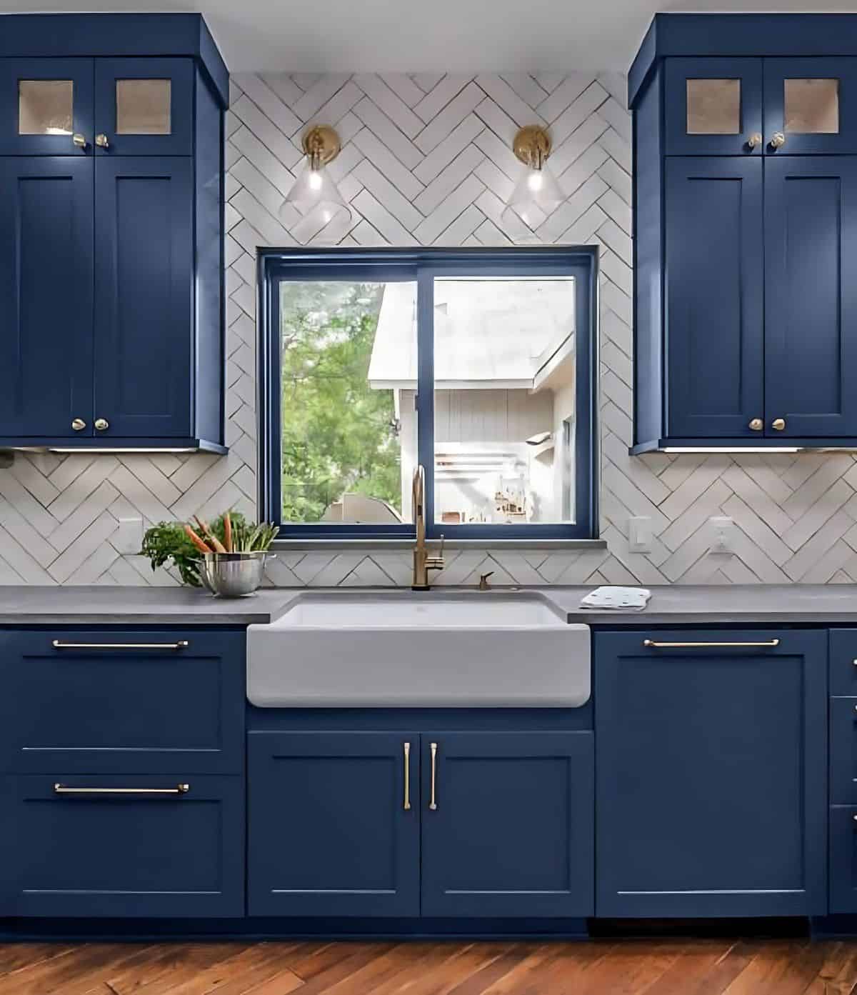 kitchen with farmhouse sink surrounded by blue cabinets