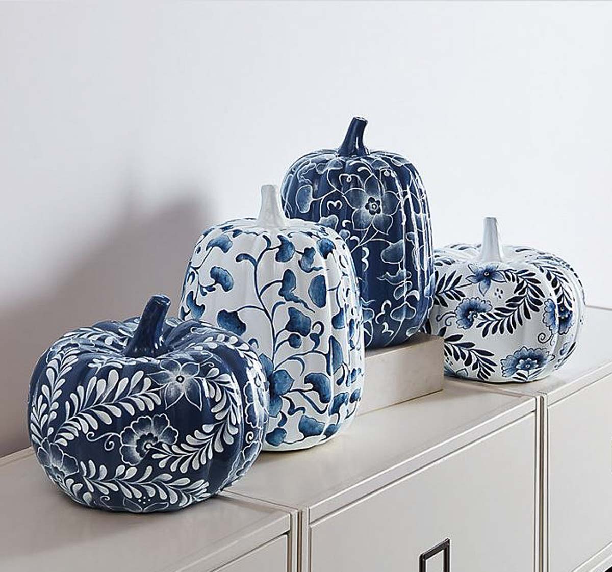 set of 4 blue and white pumpkins