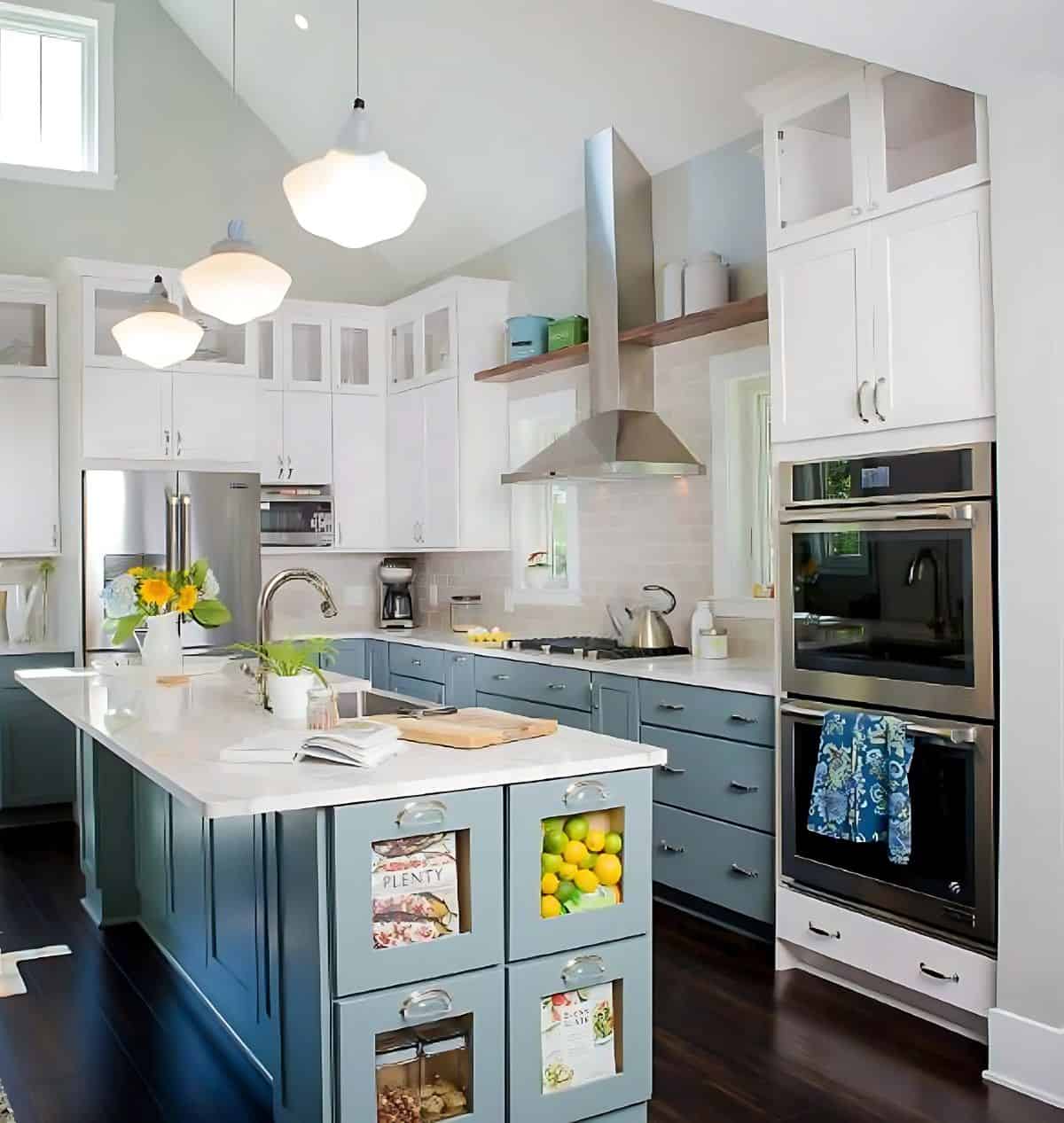 large kitchen with white upper cabinets and blue lower cabinets