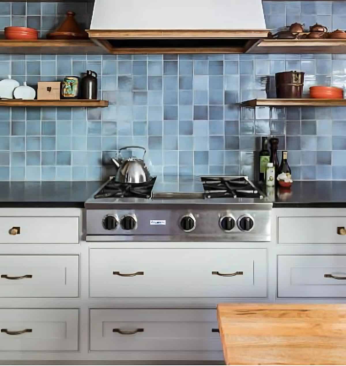 mottled blue ceramic tile backsplash in a kitchen