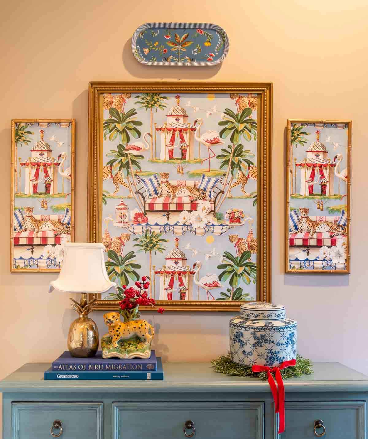 blue chest and chinoiserie artwork and accessories