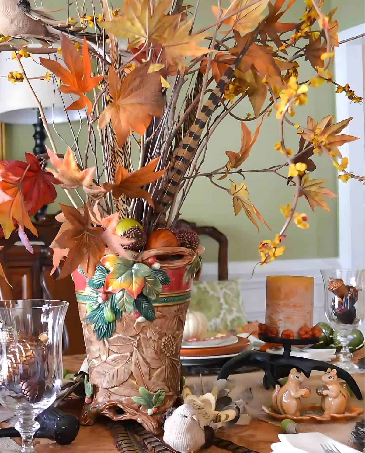 bountiful thanksgiving tablescape set with a variety of fall and traditional thanksgiving colors and elements