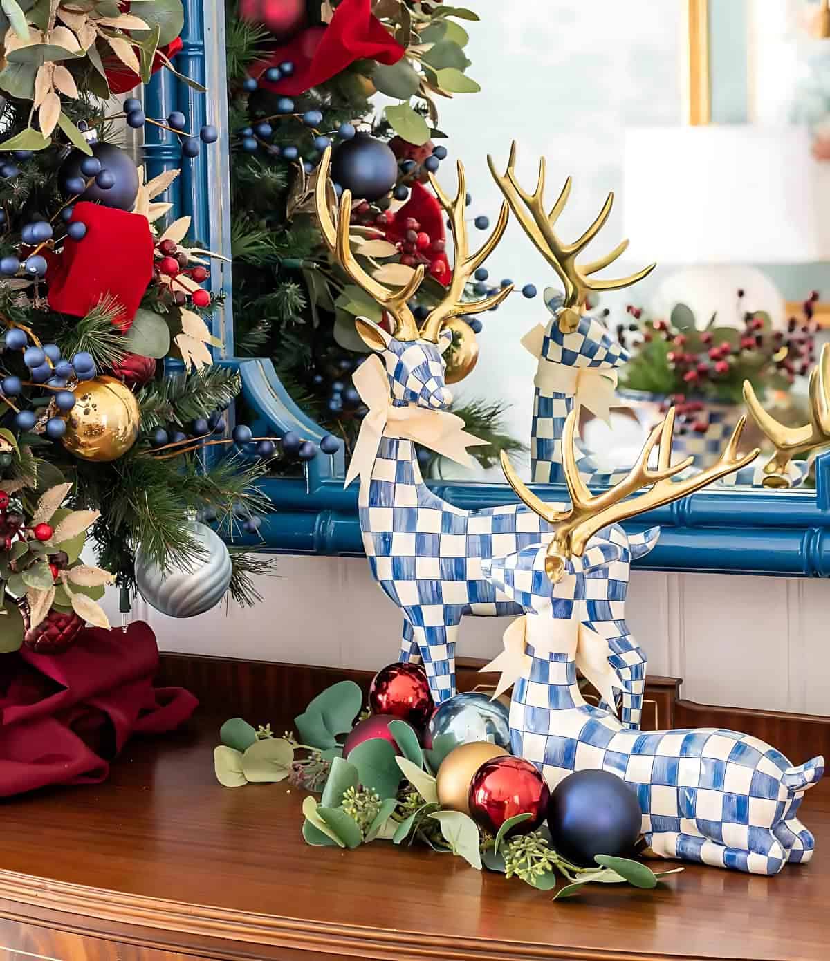 blue and white deer with gold antlers and Christmas ornaments