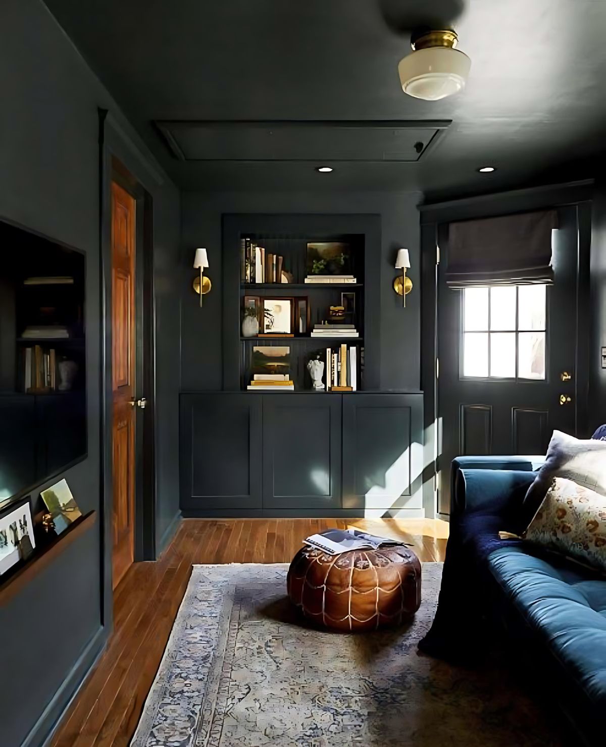 cozy living room with walls and ceiling painted dark gray