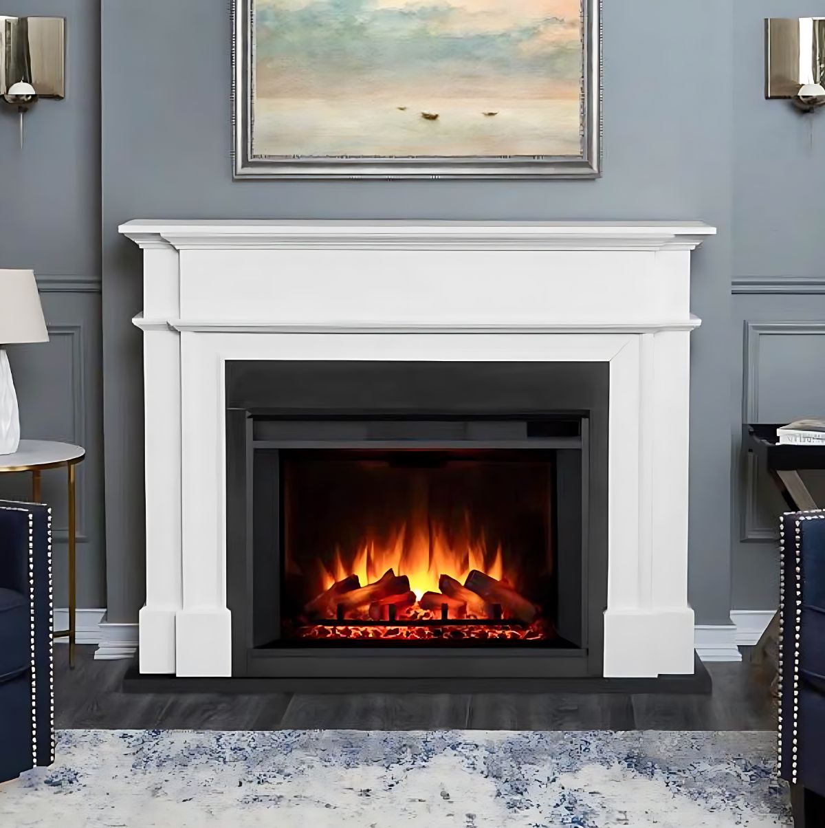 electric fireplace with a white surround in a cozy living room with dark blue walls