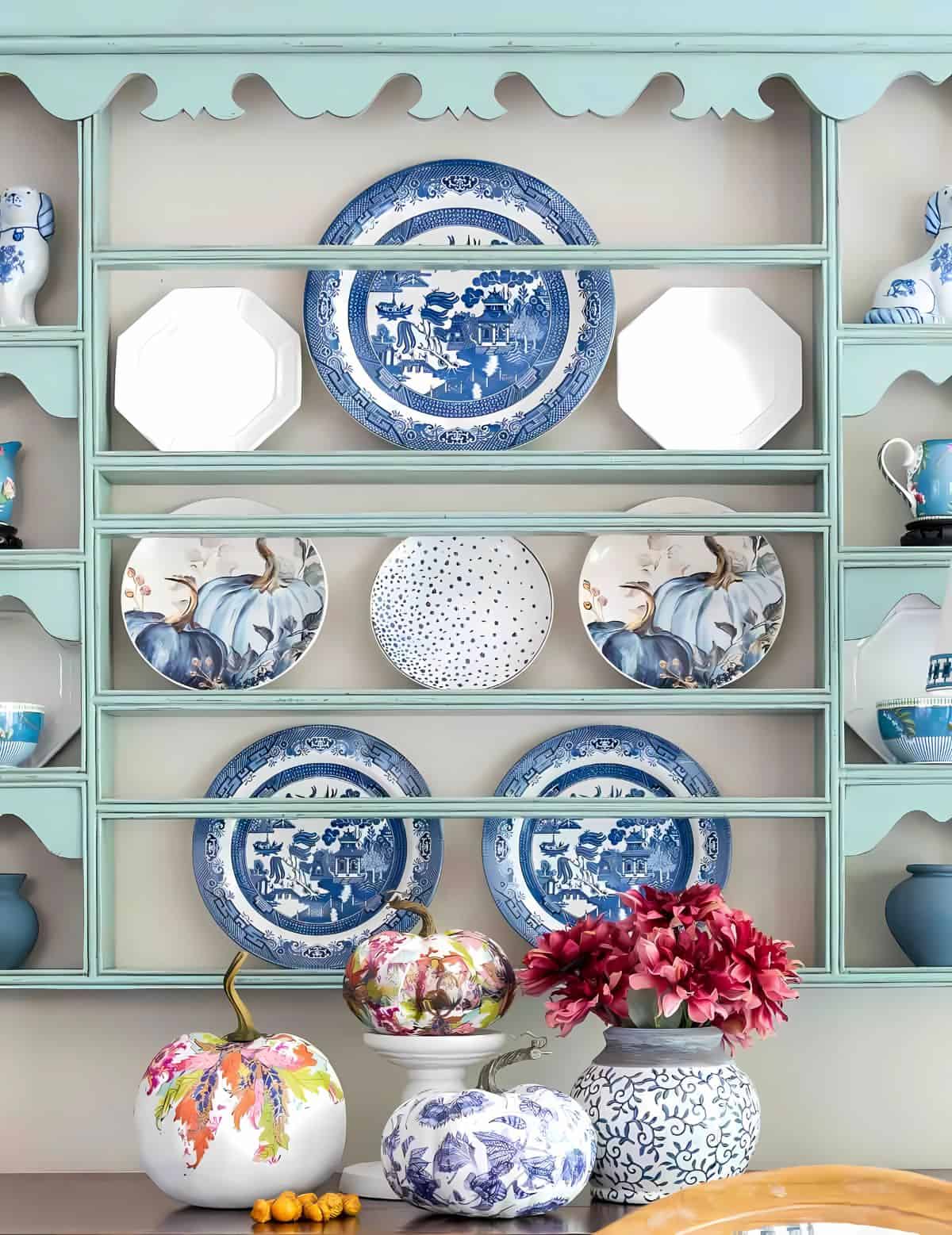 plate rack decorated with blue and white plates