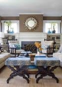 family room decorated with neutral colors and pops of dark blue