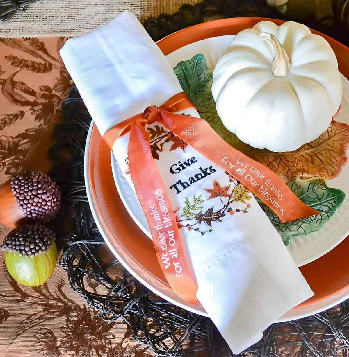 Woodland theme Thanksgiving tablescape in traditional fall colors