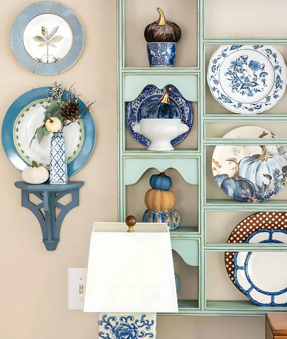 blue, white and brown dishes displayed on a plate rack for fall