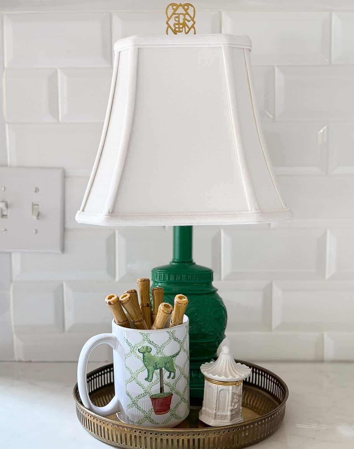 blue, white, and green accessories in an all white kitchen